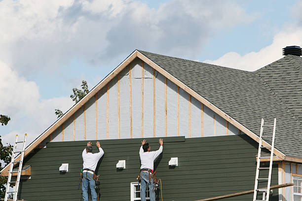 Professional Siding Contractor technician working in Carson, VA